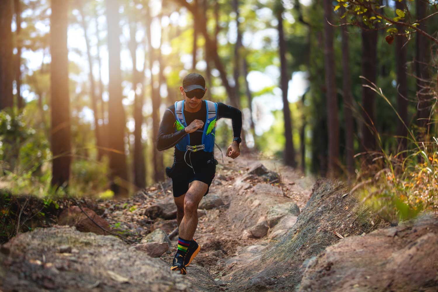 Trail runner thinks about taking a Pilates for runners class | Spine & Sport PT Rancho Santa Margarita Clinic