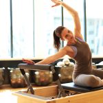 Women doing basic Pilates 101 move on equipment | Spine & Sport Physical Therapy | Rancho Santa Margarita Clinic, Irvine, CA