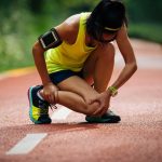 Woman with running injury | Spine & Sport Physical Therapy | San Diego, Irvine, Sacramento, CA